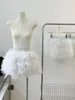 Röcke 2023 Frühlings Sommer Modefeder kurz eine Linie Frauen elastische Taille Weiß Allmatch Tutu Studentin Mini 230322