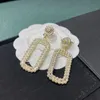 Proste stadnina 18K Gold Splated 925 Srebrna luksusowa marka projektanci Listy Stud Geometryczne Słynne kobiety okrągłe kryształowy kryształowy pearl na przyjęcie weselne kidenlry