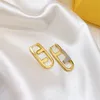 Designer Donna Uomo Orecchini Cerchi Orecchini dorati di moda di lusso intarsiati con lettere di strass Orecchini a bottone simmetrici Regalo per il giorno delle nozze