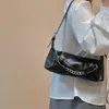 イブニングバッグ高品質の女性スモールショルダーブラックPUレザーレディースチェーンアンダーアームバッグバックルデザイン女性クラッチ財布ハンドバッグ