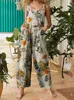 Kvinnors jumpsuits rompers kvinnor jumpsuits blad blommig tryck ärmlösa hängande overaller med fickor sommar avslappnad lös romper kvinna plus size s-5xl 230323