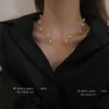 Hangende kettingen Europese en Amerikaanse elegante doublelager Pearl String Choker ketting Koreaanse mode -sieraden Sexy sleutelbeenketen voor vrouw Z0321