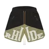 Designers Rhude Shorts Mens Basquete Calças curtas 2023 Luxurys verão letra de palmeira de praia Mesh Street Fashion Sortpants Lulusup