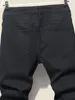 Jeans pour hommes hommes extensible déchiré maigre motard lettre dessin animé impression jean trou détruit Slim Fit Denim haute qualité Hip Hop noir jean 230323