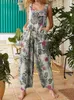 Kvinnors jumpsuits rompers kvinnor jumpsuits blad blommig tryck ärmlösa hängande overaller med fickor sommar avslappnad lös romper kvinna plus size s-5xl 230323