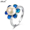 Anneaux de mariage Blaike mignon 925 argent sterling rempli fleur bleue opale de feu pour les femmes exquise bague de perle blanche bijoux cadeaux Edwi22