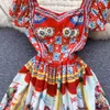 Wakacyjna drukowana sukienka średniej długości z europejską i amerykańską temperamentem strzała w stylu retro w talii