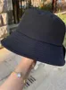 Breda brimhattar nya unisex nylon hink hattar kvinnor märkta solskyddsmedel panama hatt män ren färg sunbonnet fedoras utomhus fiskare hatt strand cap g230323