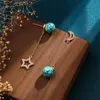 Charme Vintage design cristal étoiles et lune asymétrique Goutte d'Oreille Ancien artisanat d'or incrusté Turquoise glands boucles d'oreilles pour femmes bijoux Z0323