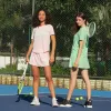 Ll vattenkyld tyg designe cool sweatshirt andningsbara yoga toppar snabb torkning tennis skjorta kvinnor utomhus springa korta ärmar skjortor
