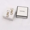 23SS 20STYEL LUXURY Designer Dangle Trablemer Letter Stud 18k золота, покрытая 925 серебряными женщинами хрустальное казин.