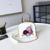 2024 Clip de metal pequeño bolso cuadrado moda cena flor hombro bolso diagonal bolsos 822