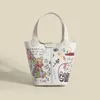 Shoulder Bags New Women designer bag Cute Versatile Little Bear Graffiti Bucket Simple Vegetable Basket Portable Steamed Bun Mother Crossbody 230323