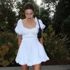 Casual Dresses Women Summer Dress 2023 Fashion White Puff Sleeve Backless Ruffle Hem Mini Party Beach Elegant Kvinna