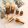 Garrafa de perfume 100pcs 1ml2ml 3ml 5ml Roll Roller Roller Roller para óleos essenciais Recipientes de desodorizantes de perfume de perfume 230323