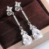 Boucles d'oreilles pendantes en cristal et zircone cubique pour femmes, accessoires de luxe, couleur argent, bijoux tendance de mariage de tempérament
