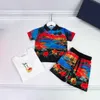 23ss meninos designer camisa de lapela t-shirt shorts terno marca conjuntos infantis gola redonda impressão shorts de manga curta camisas Conjunto de três peças Roupas infantis de alta qualidade a1