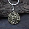 Keychains 12st Retro Fire and Sun God Pendant Keychain Unique Round Face Amulet Pagan Jewelry