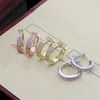 2023 Varumärke Luxury Crystal Titanium Steel Hoop Earrings Women's Fashion Charm Love Diamond Earrings High Quality Designer örhängen