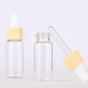 빈 화장품 에세스 병 5ml 10ml 15ml 20ml 유리 드롭퍼 포장 병이있는 플라스틱 나무 곡물 캡