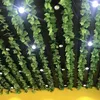 Fiori decorativi Confezione da 12 viti finte Ghirlanda di edera artificiale Piante pendenti verdi Foglie finte di verde Arredamento camera da letto per la parete del giardino di casa