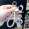 Keychains Fashion DIY Handgjorda nyckelringar 3D Animal Metarial Acrylic Key Ring Elegant Bag Handbag Llavero Crystal Pearl