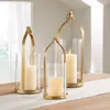 Partes de velas Candelera de oro Luxury Arte hecho a mano Vidrio de hierro Cena Centro de mesa de bodas de lámpara de viento Centres de bodas Deco en el hogar