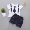 Kläder sätter sommarbarn kläder baby kortärmade byxor med fluga remmen småbarn bomull barn pojkar och flickor kostym kostym