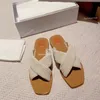 Designertofflor Kvinnor Woody Flat Mules Sandaler Slides Segel Canvas Vit Svart Kvinnor Utomhus Beach Tofflor Skor Flätad sandal