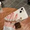 Cas de téléphone portable de mode femme pour iPhone 14 Promax 13 12 11 Xs Xr Xsmax Étui de téléphone en cuir de luxe Designer Pearl Bracelet IPhone Case