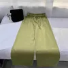 Zielone spodnie damskie mody litera drukująca elastyczna talia sznurka swobodne spodnie luźne wersja projektant mody szerokie nogi odchudzone spodni odzież Kobiety