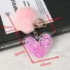 Keychains 1PC Cute Women Acrylic Pink Heart Glitter Hollowed-out Handbag Charms With Puffer Ball Gifts