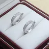 2023 Varumärke Luxury Crystal Titanium Steel Hoop Earrings Women's Fashion Charm Love Diamond Earrings High Quality Designer örhängen