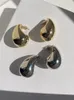Lustre de lustre huanzhi gota de garanhão meio vazio para mulheres para mulheres bronze metal liso metal personalizado charme simples jóias da moda 2023 230323