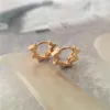 Pendientes de aro Super lindo chapado en oro Colro pequeña forma de estrella Huggie para mujer chica elegante hermosa joyería informal diaria