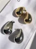 Lustre de lustre huanzhi gota de garanhão meio vazio para mulheres para mulheres bronze metal liso metal personalizado charme simples jóias da moda 2023 230323