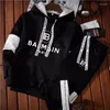 Tracksuits 2023 Mens 캐주얼 스웨트 셔츠 세트 후드 팬티 스웨터 트랙복 2 PCS 의상 조깅하는 남성 풀버 스프링 스트리트웨어