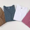 Kvinnors T-skjortor Tuangbiang vår sommar 2023 Pocket Button Cotton T-shirt Korean Casual V-ringning Långärmad mjuk t-shirt Fashions Kvinna