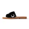 2023 Tofflor Designer Kvinnor Woody Flat Mules Sandaler Slides Segel Canvas Rosa Blå Vit Svart Kvinnor Utomhus Beach Tofflor skor modeplattform sandaler