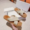 Designertofflor Kvinnor Woody Flat Mules Sandaler Slides Segel Canvas Vit Svart Kvinnor Utomhus Beach Tofflor Skor Flätad sandal