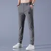 Pantaloni da uomo Primavera Estate Harem Uomo Cotone Sottile Elastico Coulisse Vita Fascio Piedi Pantaloni larghi blu chiaro Pantaloni cargo sportivi Uomo 230324