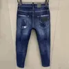 Herr jeans stjärnbags dsq mode trendiga mäns tvätt slitna hål lappar färg bläck trim små fötter blå