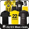 22 23 110 ° Maglie da calcio Borussia Haaland Kamara 2022 2023 Shirt da calcio nero Reus Bellingham Hummels Reyna Brandt Dortmund Men Kid Kit Maillot de Foot