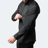 Herrklänningsskjortor Mannens skjorta affärs fritid långärmad ren färg silkes vertikal elastik på våren och sommaren