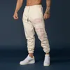 Męskie spodnie jesienne męskie dresowe sporty sporty rekreacyjne trening fitness legginsy spodnie Mężczyzny Trendy Wzór modowy Drukuj Slim Streetwear 230324