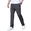 Men's Pants Hommes jogging ample sport pantalons de course vêtements de sport coton pantalon Joggers formation taille élastique pantalon de survêtement décontracté pantalons de sport W0325