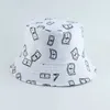 Wide Brim Hats New Dollar symbol Print Blk Bucket Hats Harajuku Hip Hop Cap Bob Chapeau Men Women Summer Fisherman Hat P230311