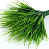 Dekorativa blommor 1st Plastic Wheat Grass Artificiella växter utomhus UV -resistenta falska grönska buskar för utanför