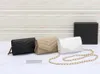 Busta Borsa a catena Mini Lady Borsa a tracolla Luxury Celebrity Banchetto Borse di moda Designer Nero Bianco Portafogli albicocca Dimensioni 14 * 3 * 8 cm
