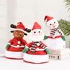 Elektroniczne zabawki Plush Christmas Hat Hat Electric Plush Toys Dance Sing Shine Santa Claus Hat Hat Gifts Prezenty Posylne Zwierzęta dla dzieci 230325